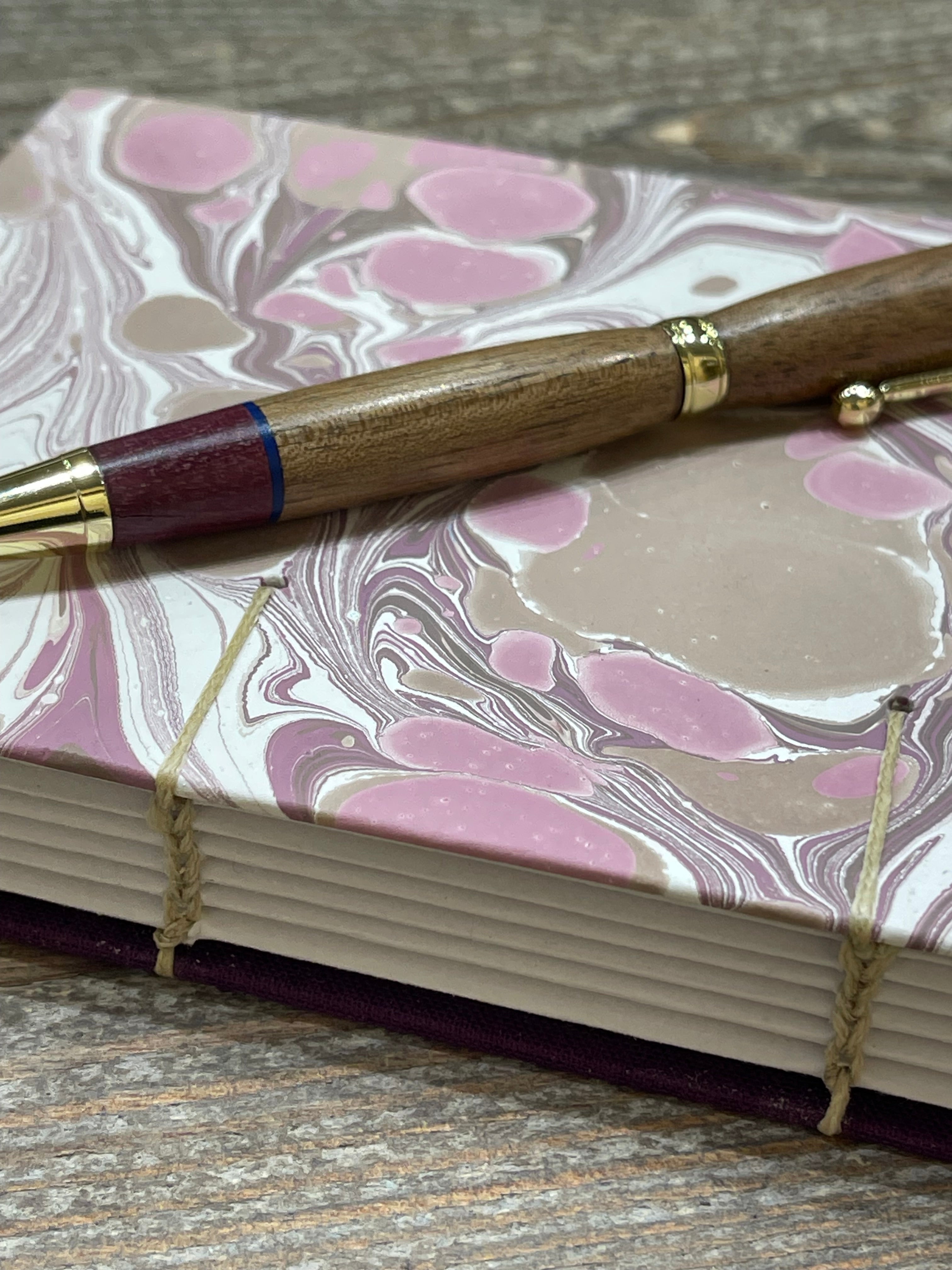 Hand marbled coptic bound sketch book in soft taupe and purples