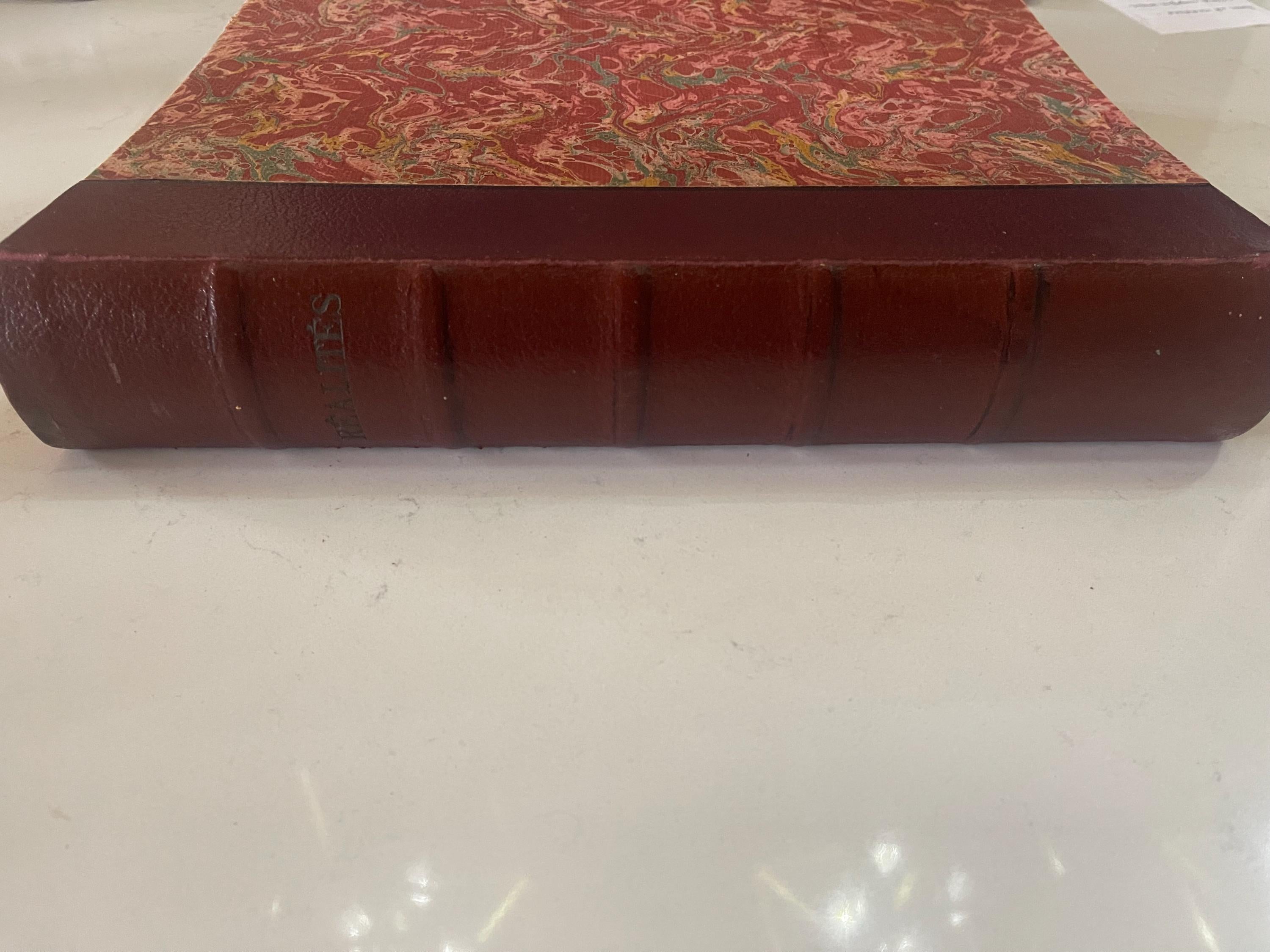2 marbled, leather-bound volumes of 12 issues of the iconic French magazine Réalités dating from 1953.