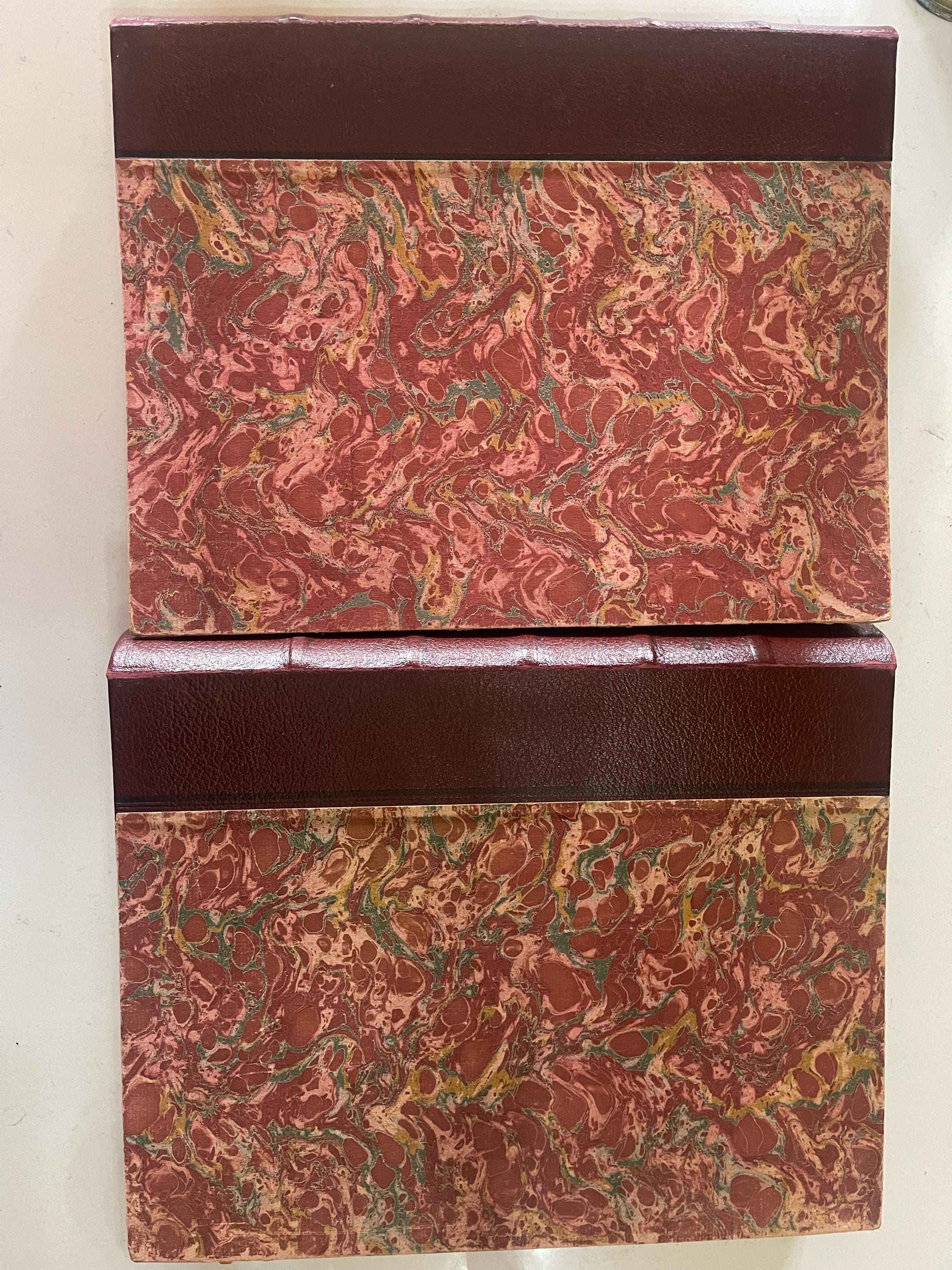 2 marbled, leather-bound volumes of 12 issues of the iconic French magazine Réalités dating from 1953.