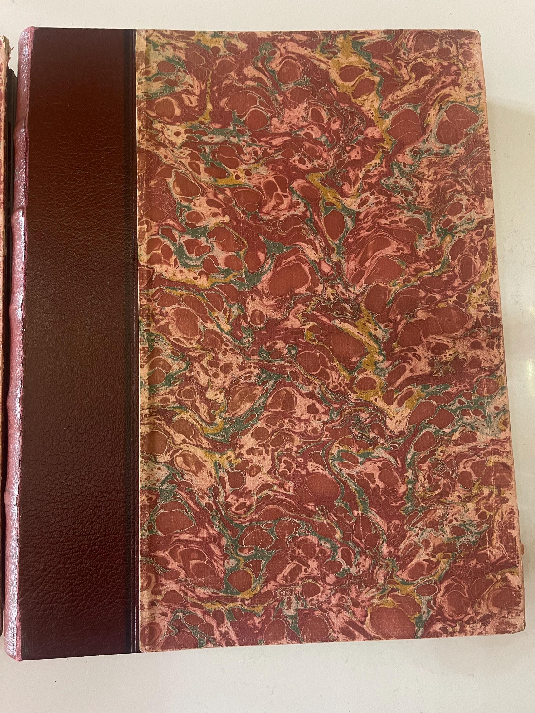 2 marbled, leather-bound volumes of 12 issues of the iconic French magazine Réalités dating from 1953.