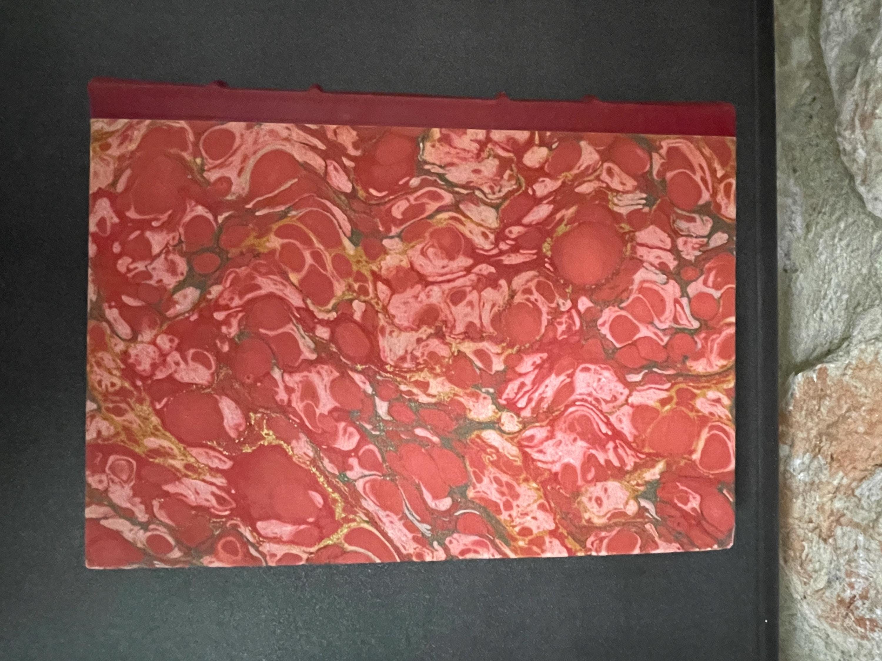Collection of 4 colourful leather bound green, red, brown and blue marbled books from the mid 1950s France, ideal decorative pieces