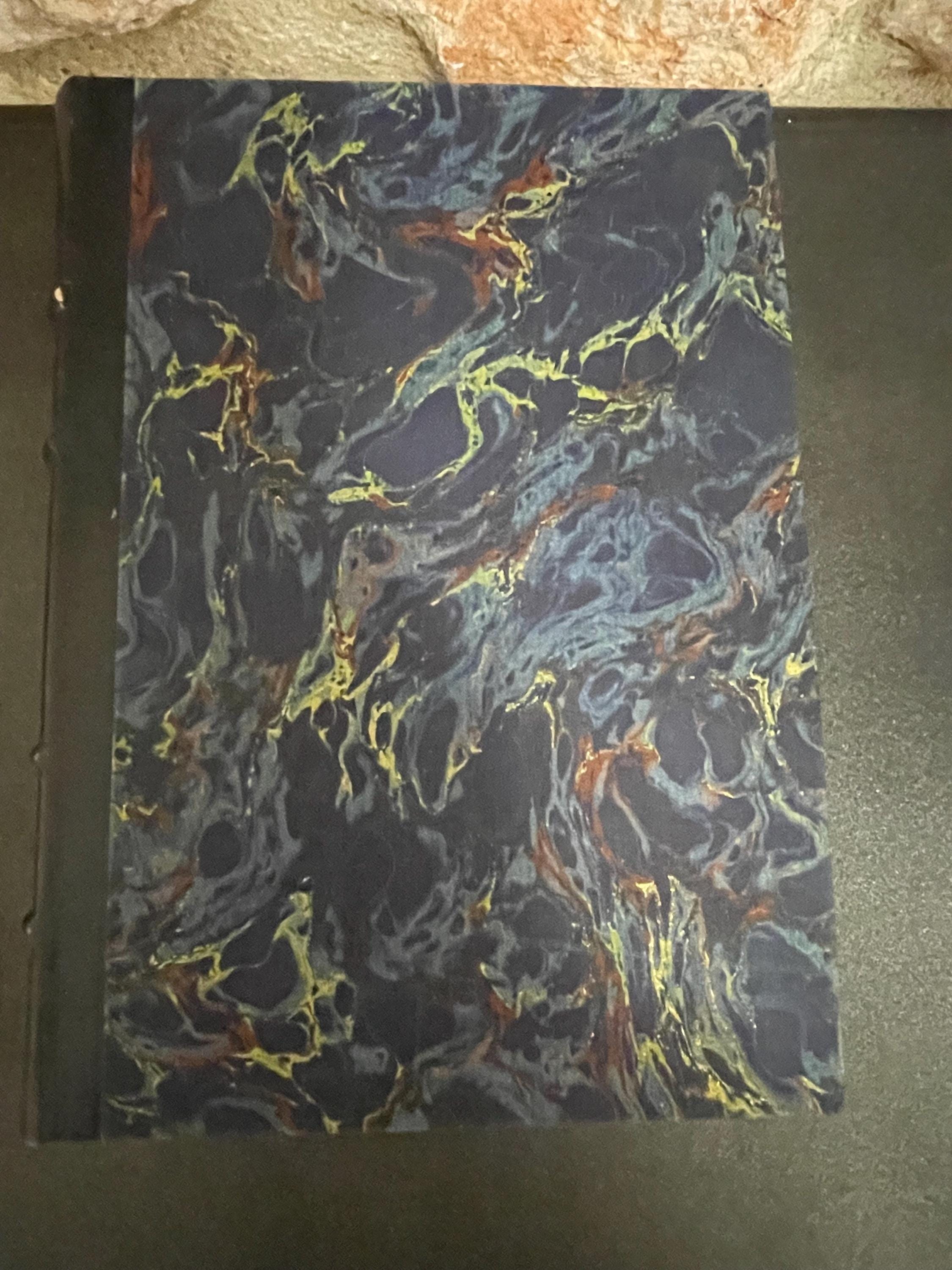 Collection of 4 colourful leather bound green, red, brown and blue marbled books from the mid 1950s France, ideal decorative pieces