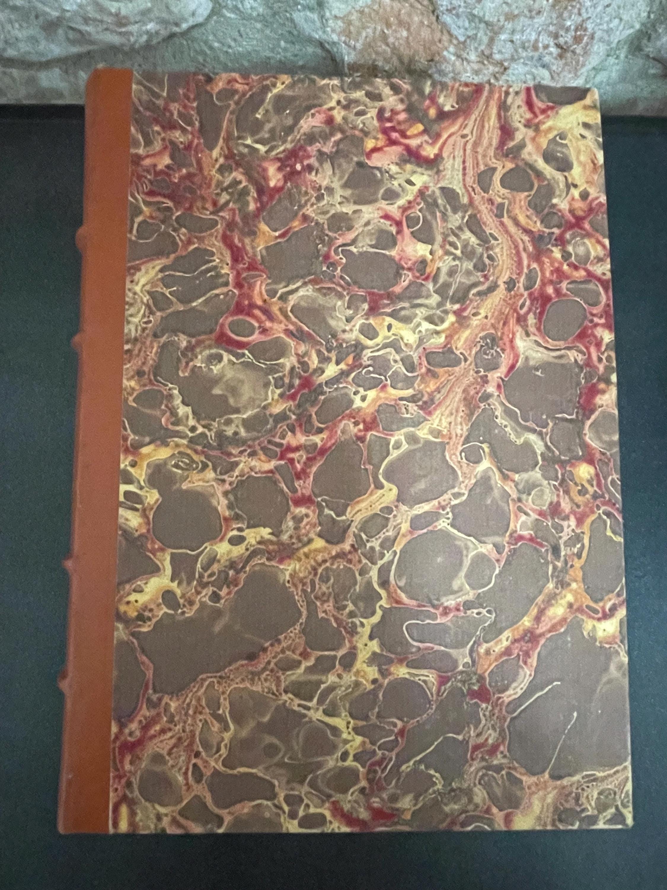 Collection of 4 colourful leather bound green, red, brown and blue marbled books from the mid 1950s France, ideal decorative pieces