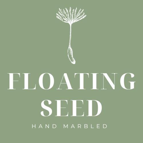 A pair of unique silk green and plum hand marbled drum table lampshades ideal as table or bedside lamps