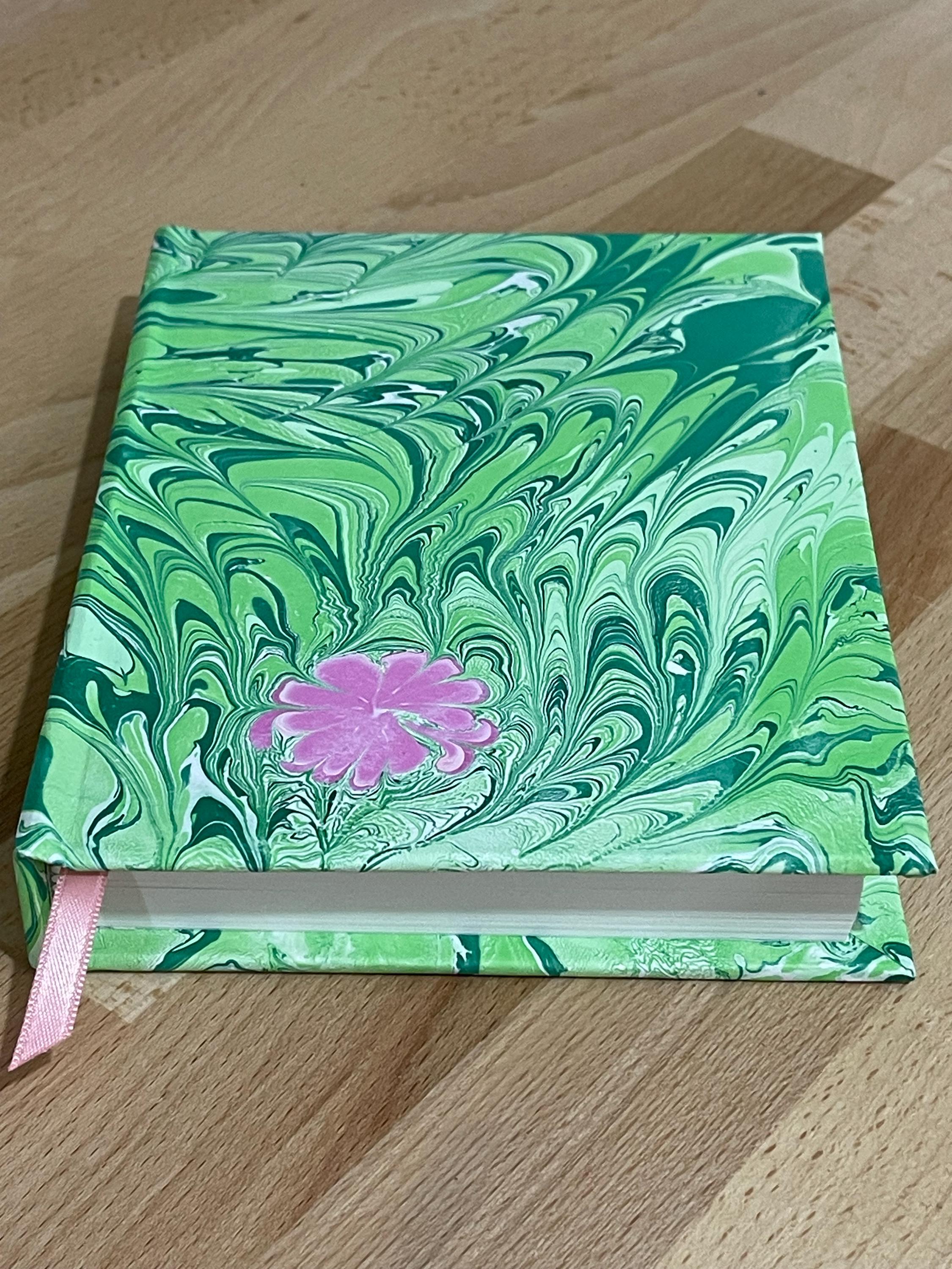 Hand marbled/painted flower notebook journal in green and pink with pink book mark and recycled white lined pages