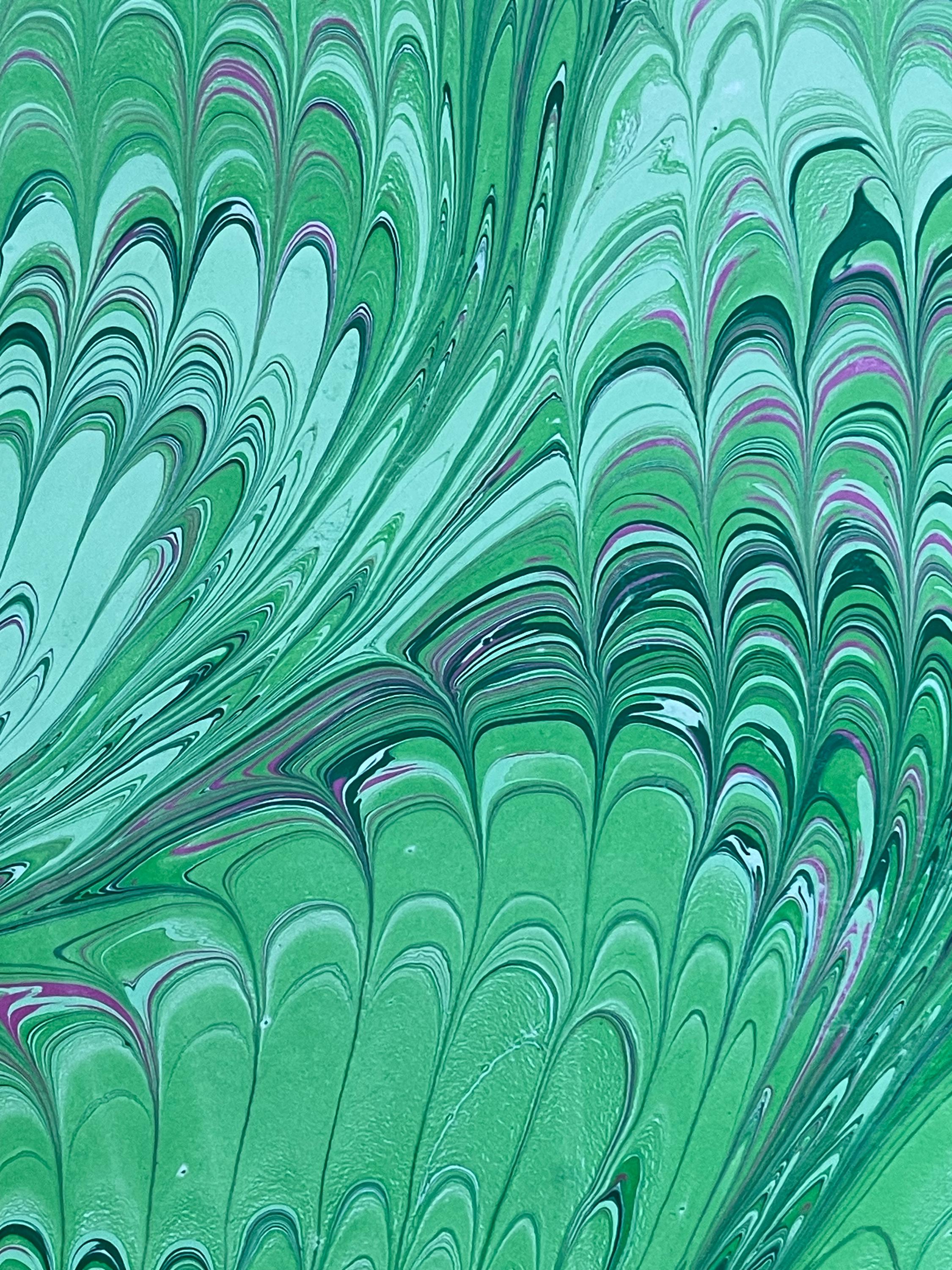Hand marbled/painted notebook journal in a green and pink non pareil pattern with a pink book mark and recycled white lined pages