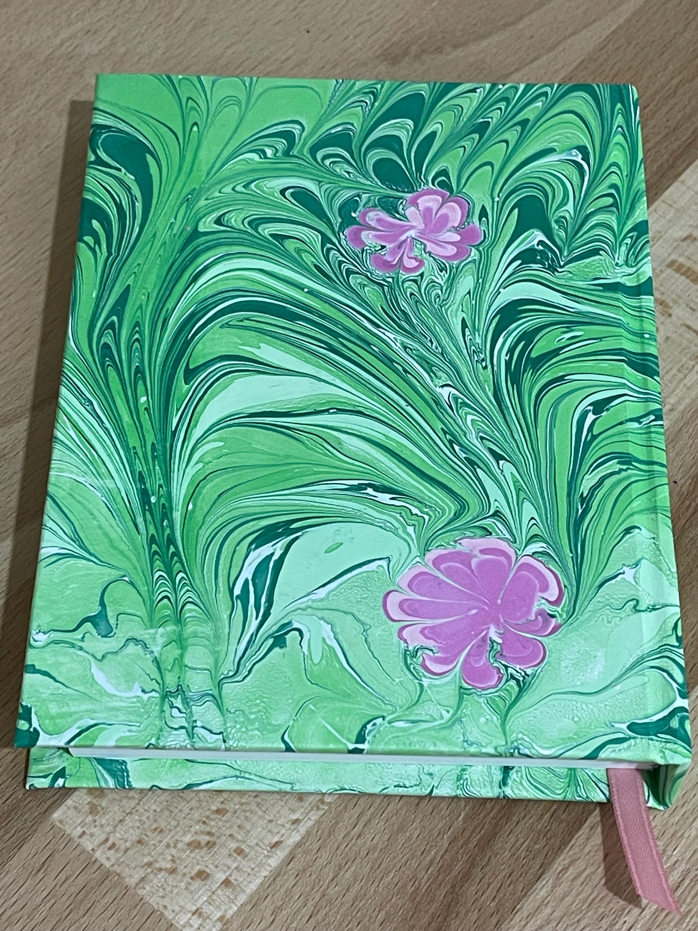 Hand marbled/painted flower notebook journal in green and pink with pink book mark and recycled white lined pages