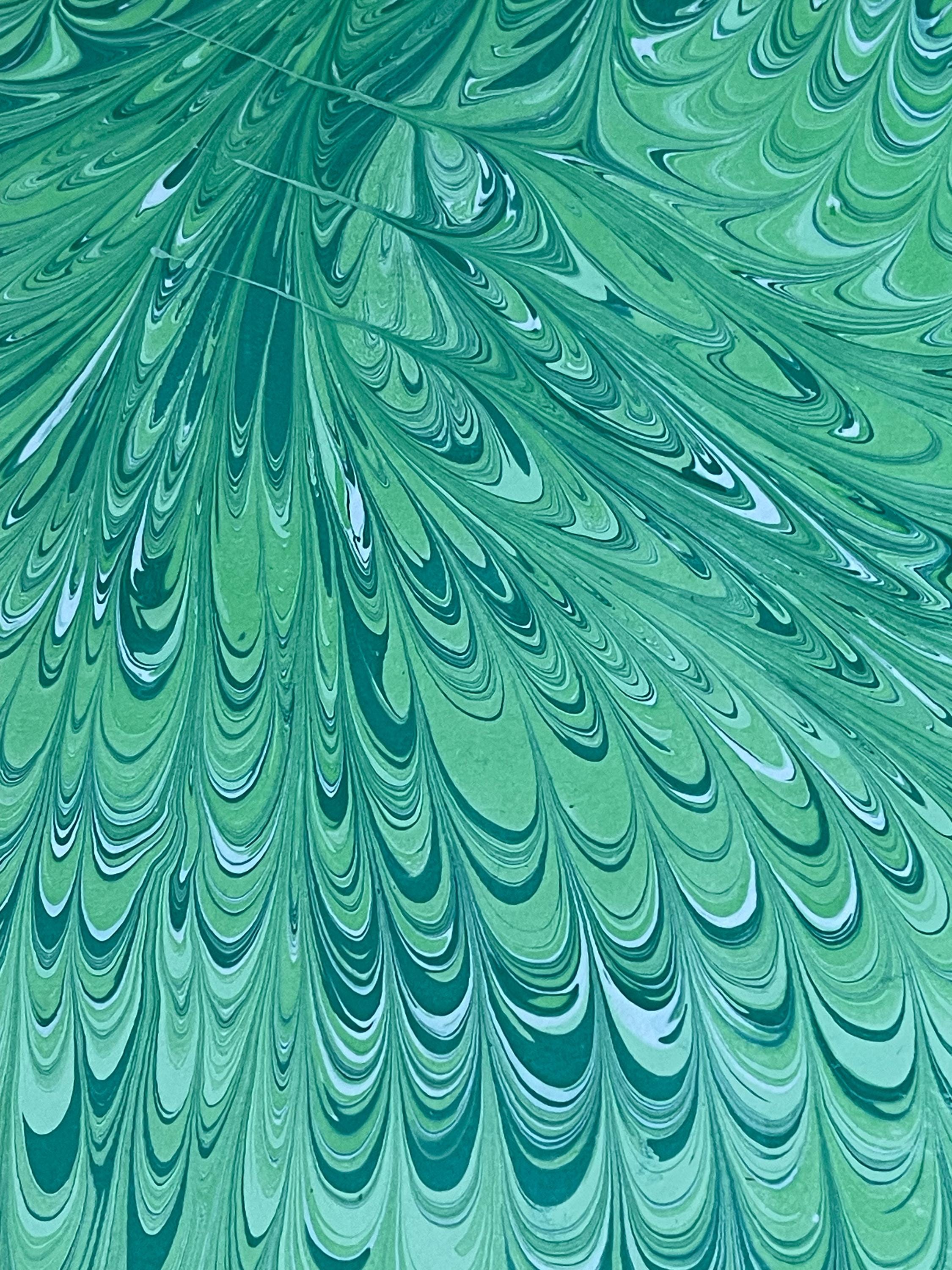 Hand marbled/painted notebook journal in a green non pareil pattern with a green book mark and recycled white lined pages