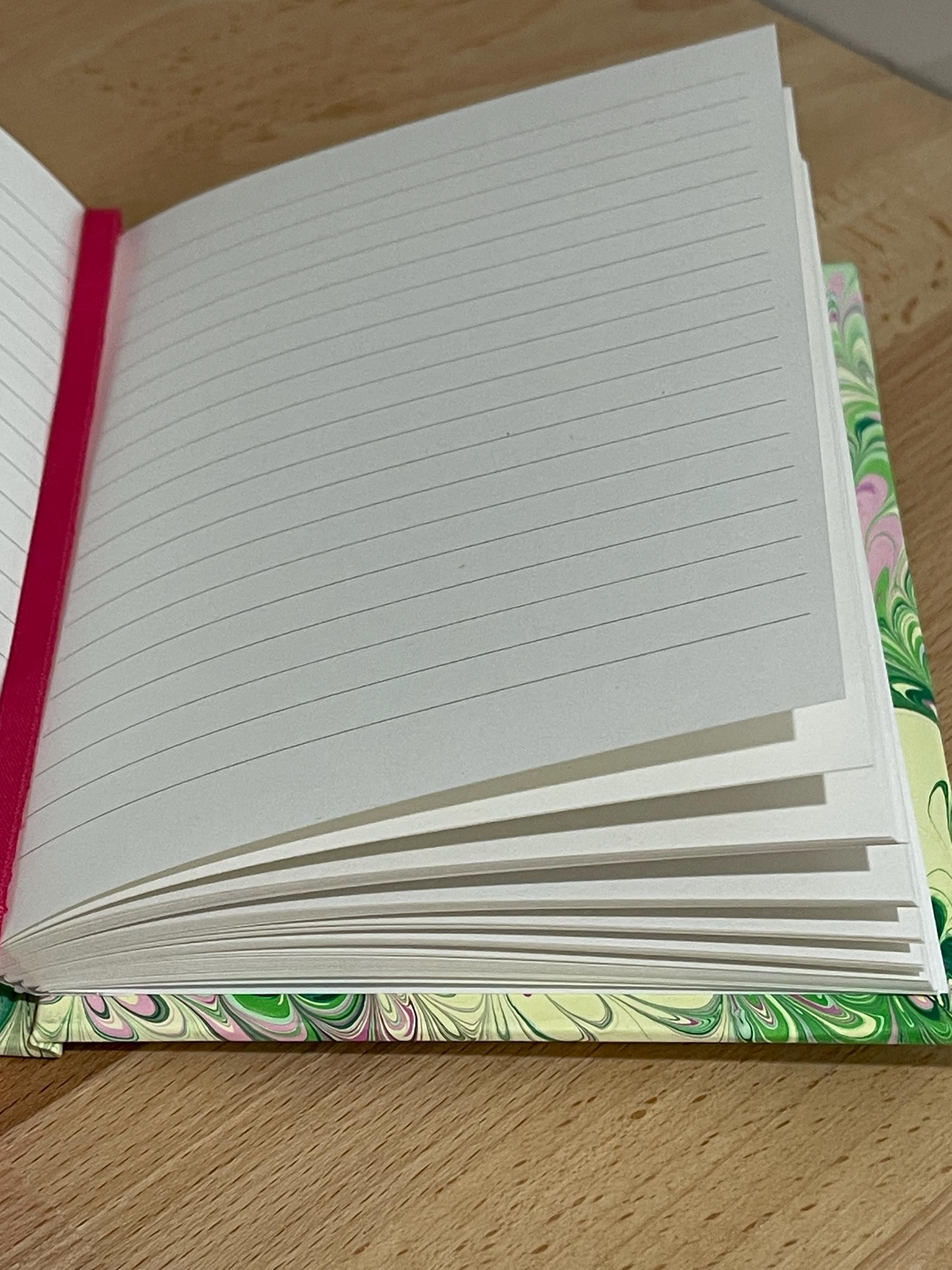 Notebook / Journal hand marbled/painted in a green, yellow and pink pattern with a pink book mark and recycled white lined pages