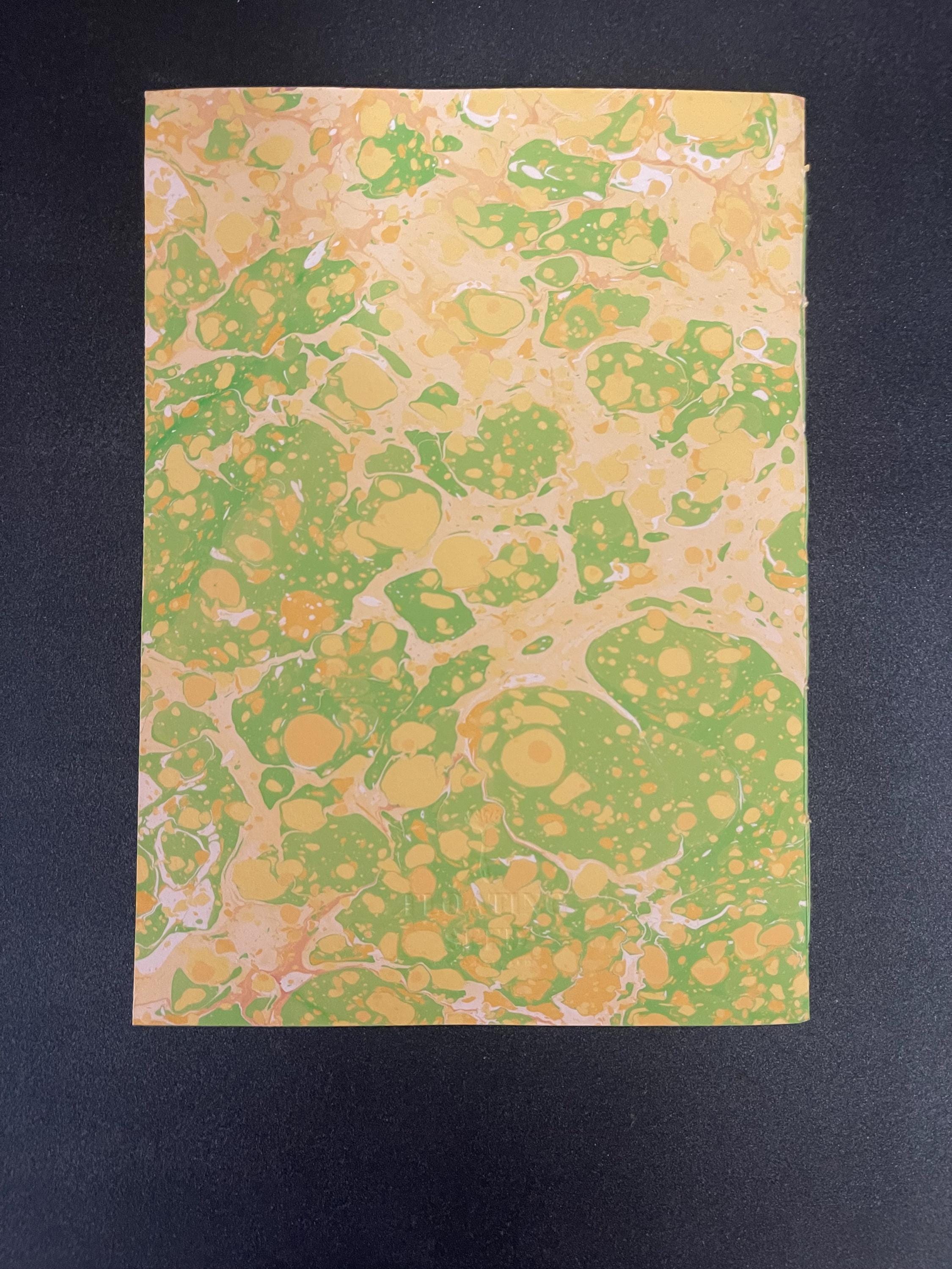 Hand sewn, hand marbled sketchbook, notebook, journal, softcover in sunny yellows and greens with recycled 120g white plain drawing pages.