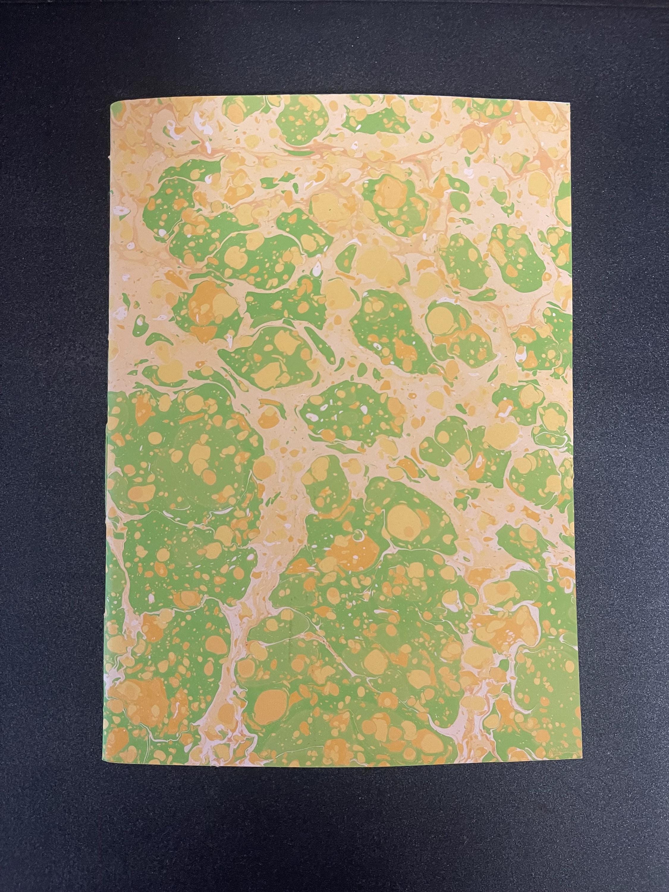 Hand sewn, hand marbled sketchbook, notebook, journal, softcover in sunny yellows and greens with recycled 120g white plain drawing pages.