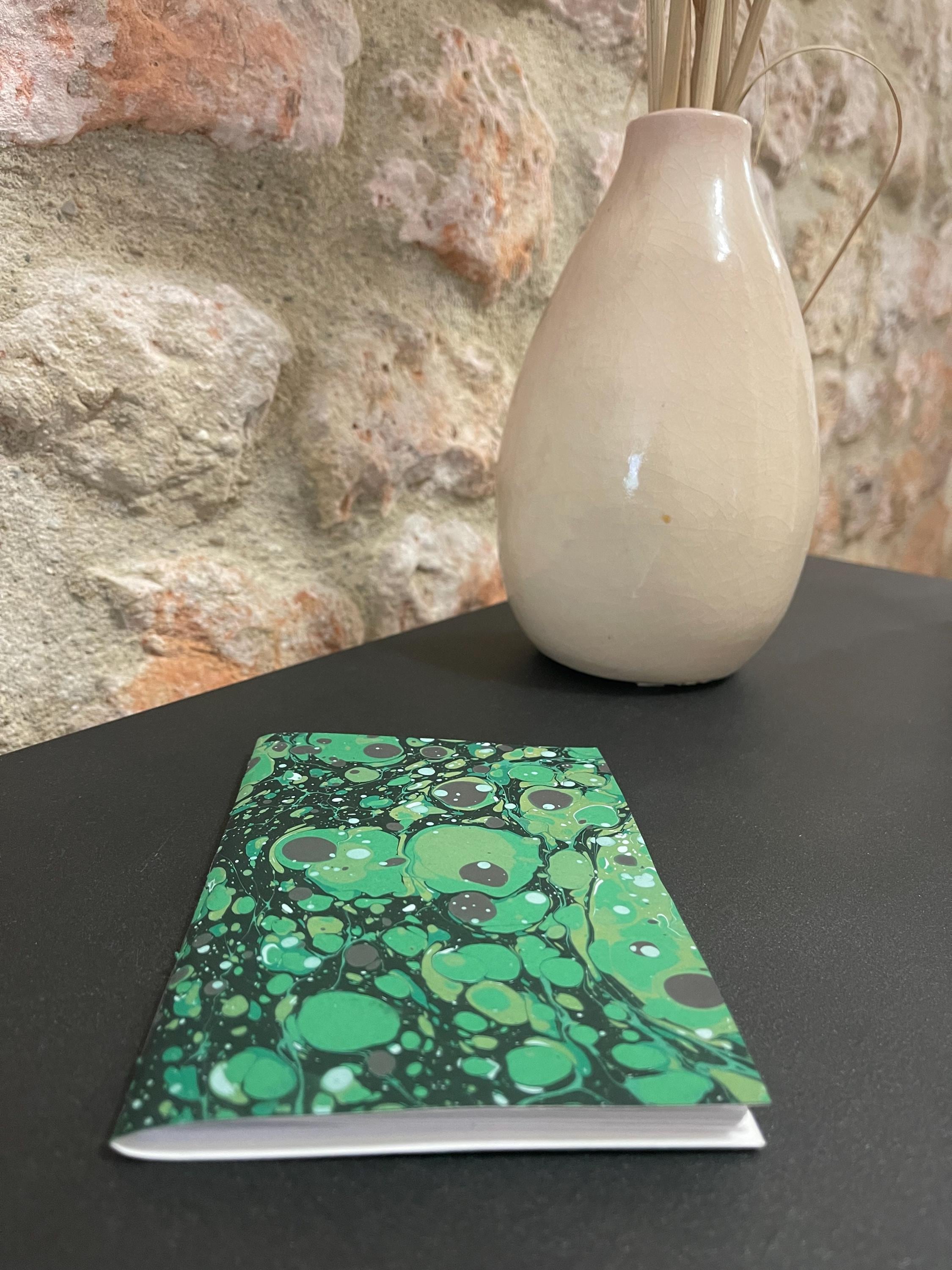 Hand sewn, hand marbled pocket notebook, A6, soft cover in greens, greys and blacks with 80 pages of lined 80g/m2 paper. Unique gift.