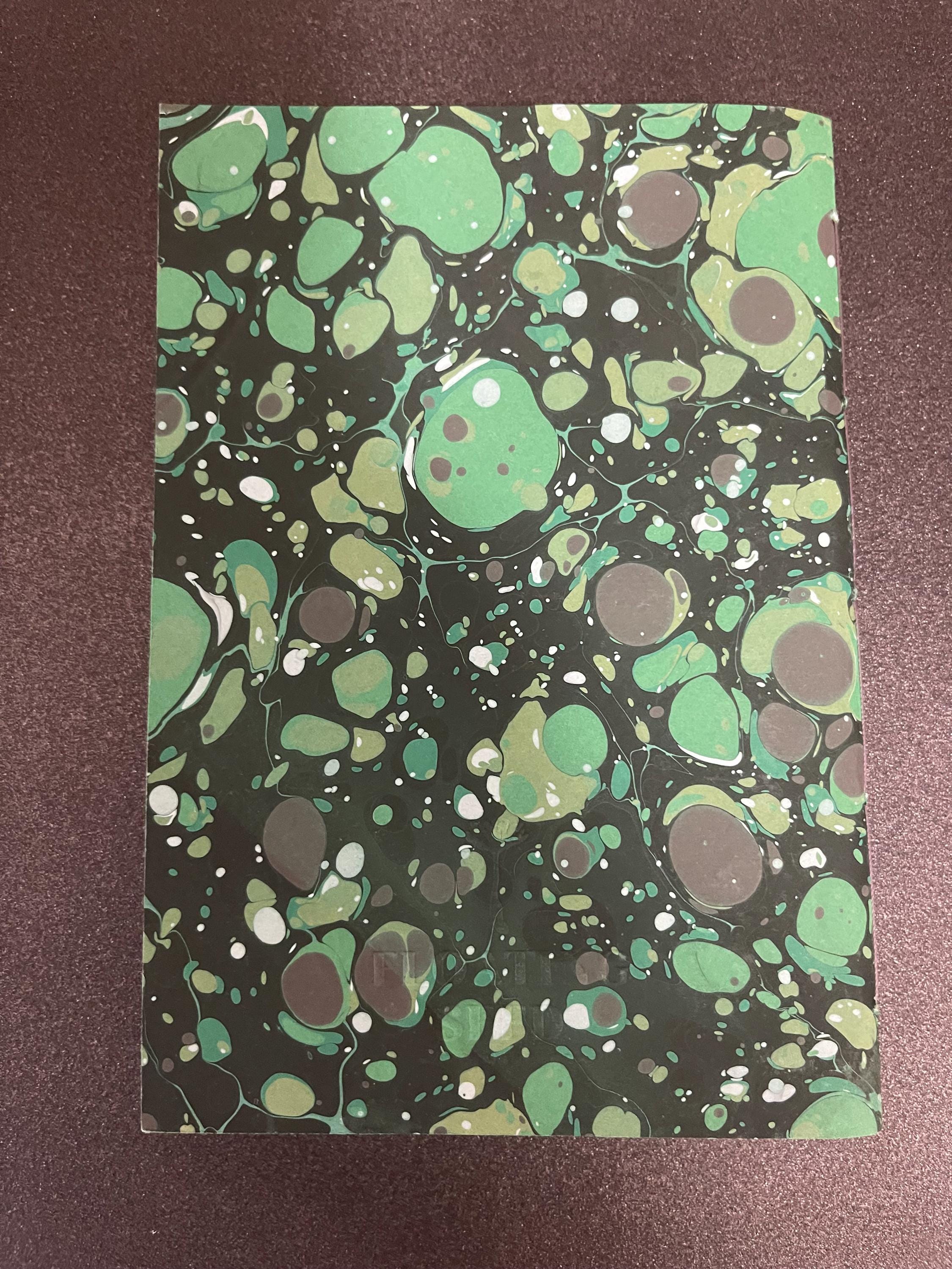 Hand sewn, hand marbled pocket notebook, A6, soft cover in greens, greys and blacks with 80 pages of lined 80g/m2 paper. Unique gift.
