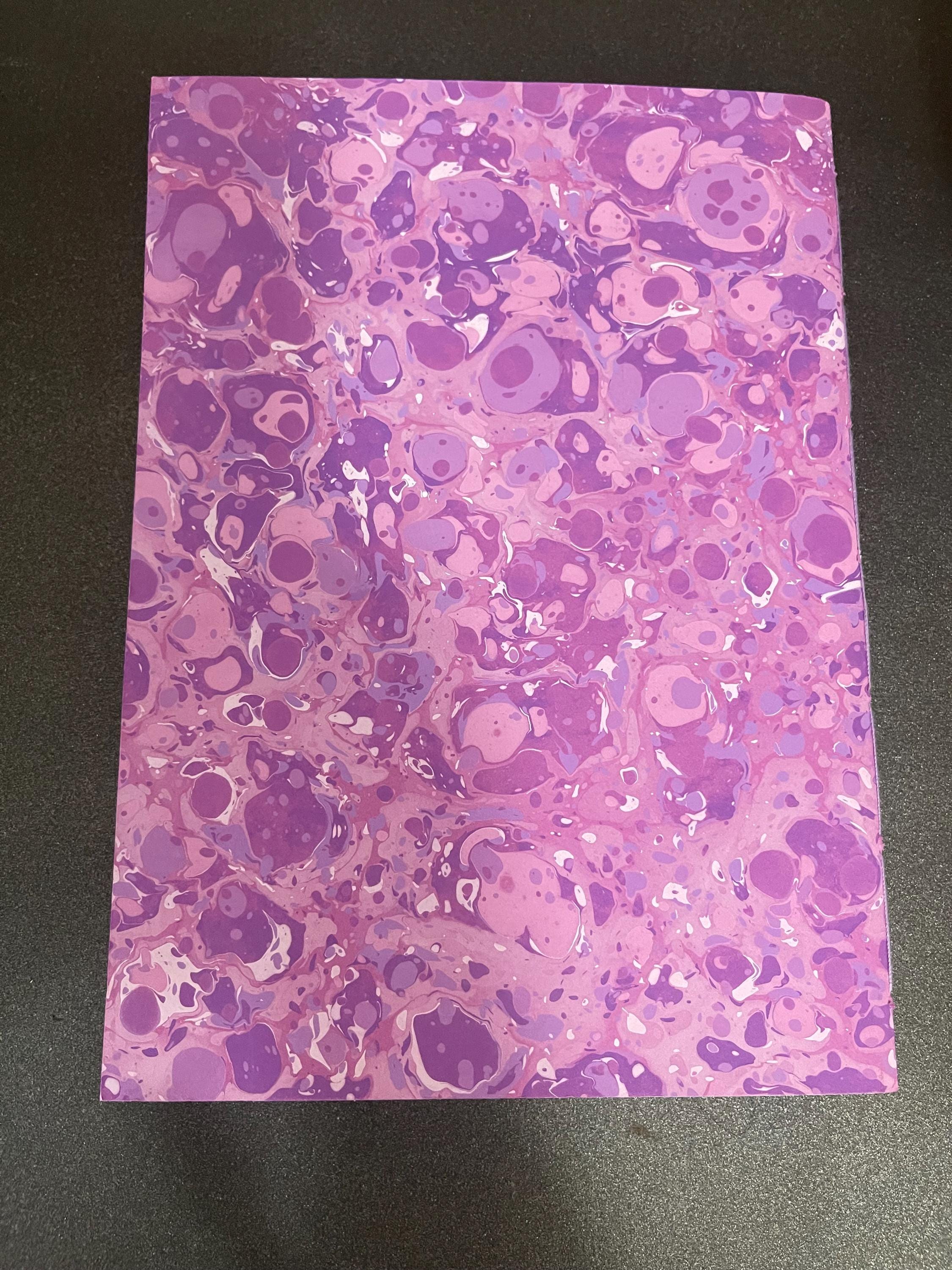 Hand sewn, hand marbled sketchbook, notebook, journal, softcover in lavender, purples w/ splashes of white with recycled white plain pages.