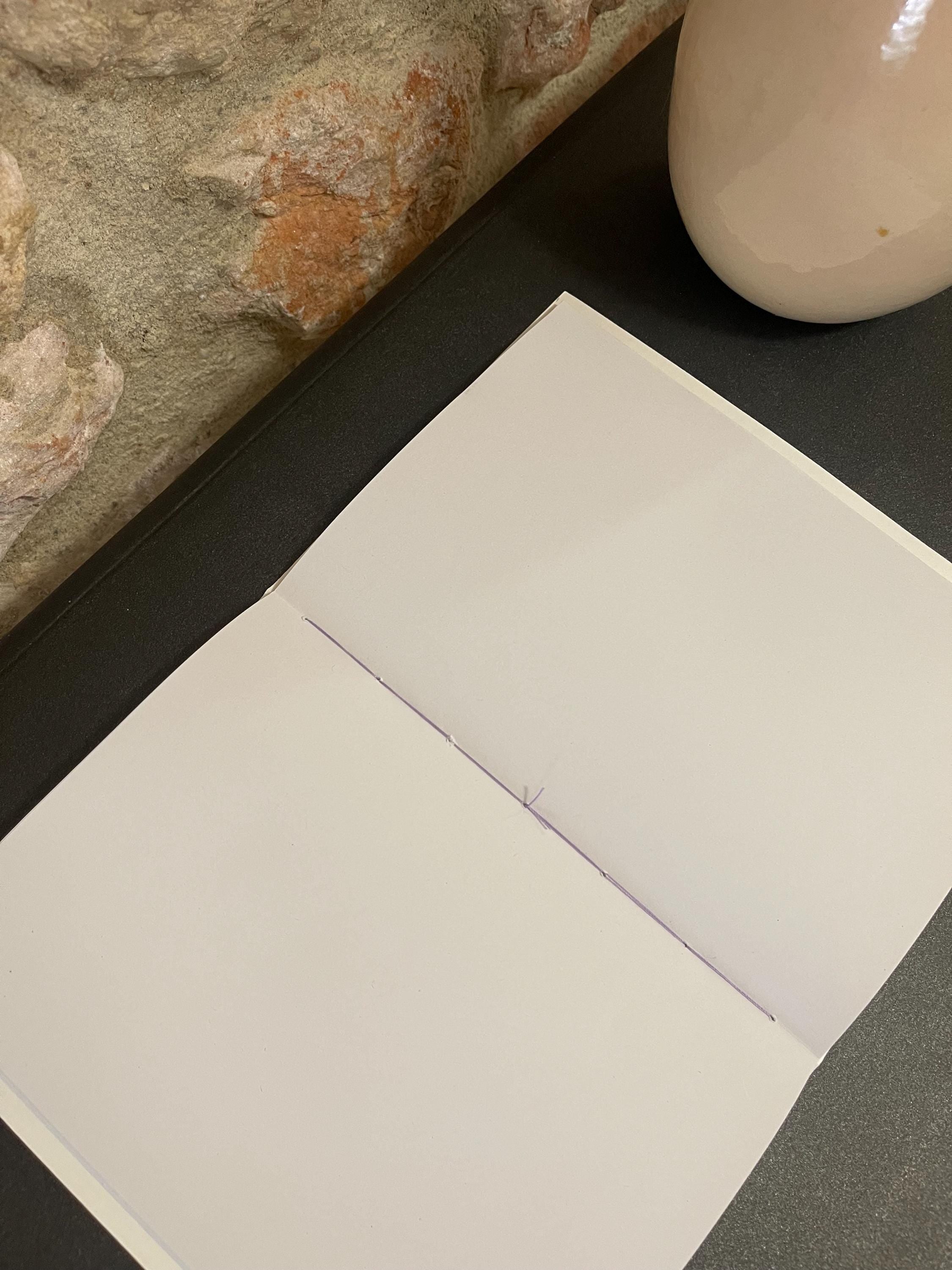 Hand sewn, hand marbled sketchbook, notebook, journal, softcover in lavender, purples w/ splashes of white with recycled white plain pages.