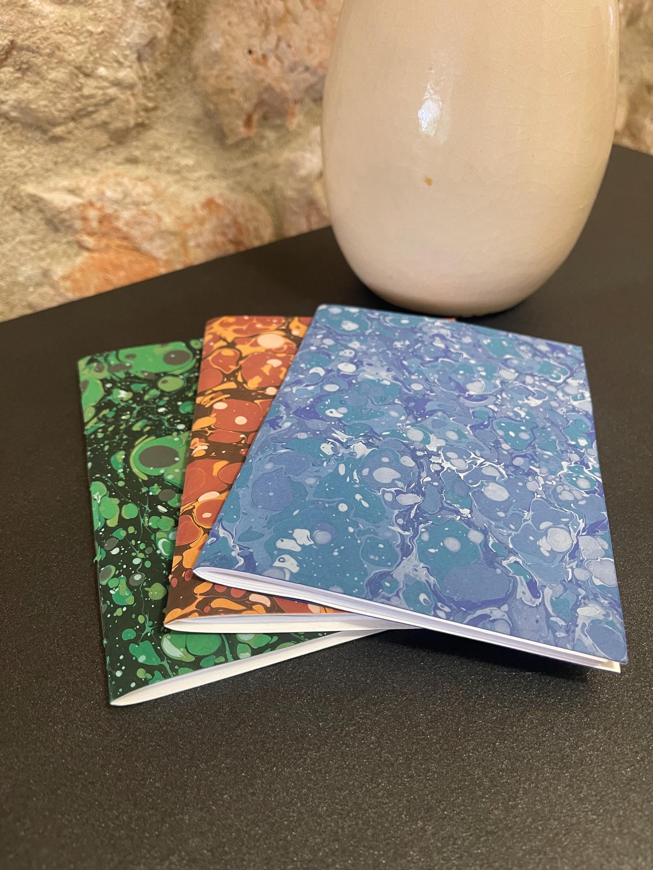 Pocket lined notebook, hand sewn, hand marbled soft cover, A6, in blues, stone pattern with 80 pages of lined 80g/m2 paper. Unique gift.