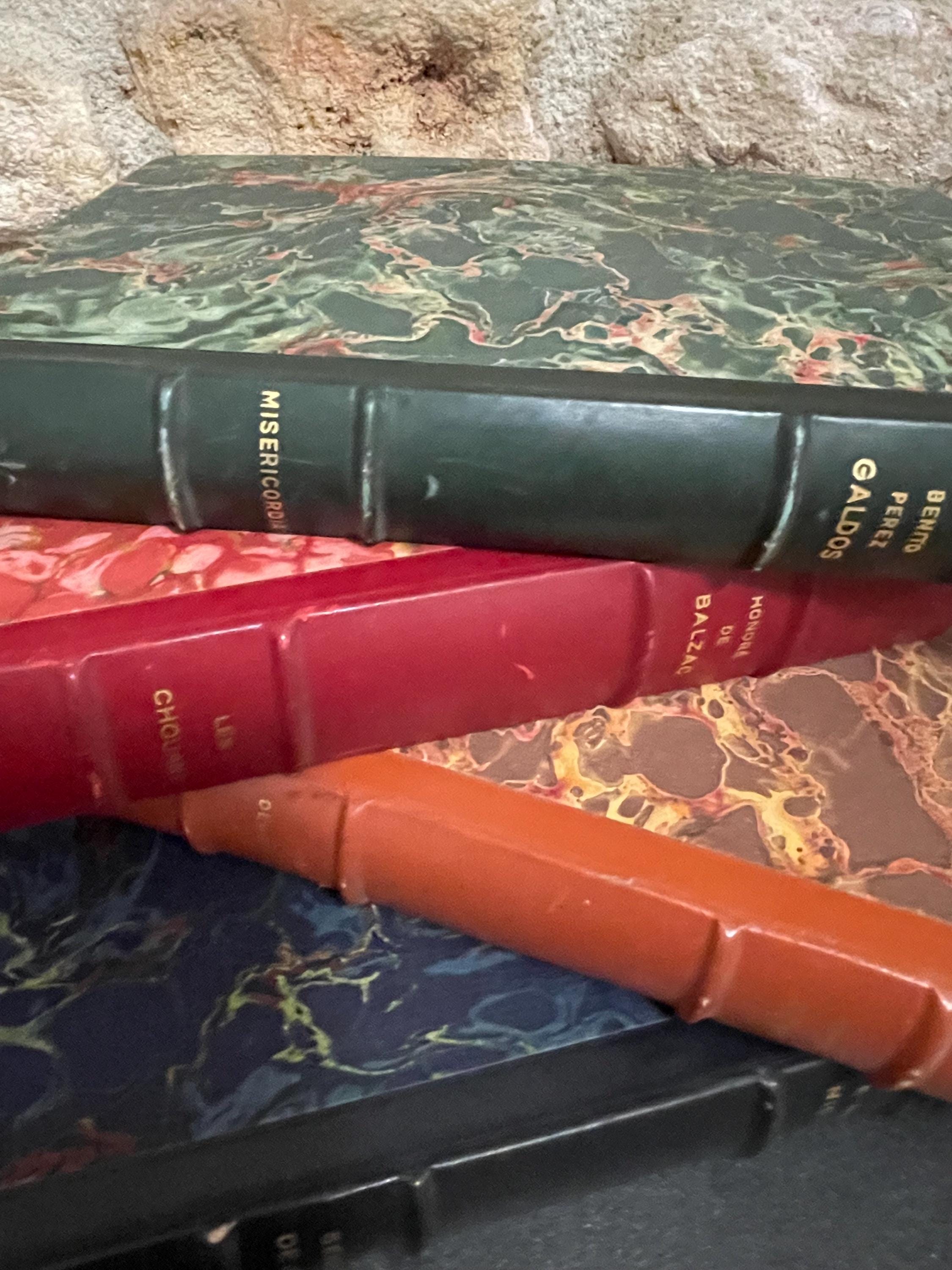 Collection of 4 colourful leather bound green, red, brown and blue marbled books from the mid 1950s France, ideal decorative pieces
