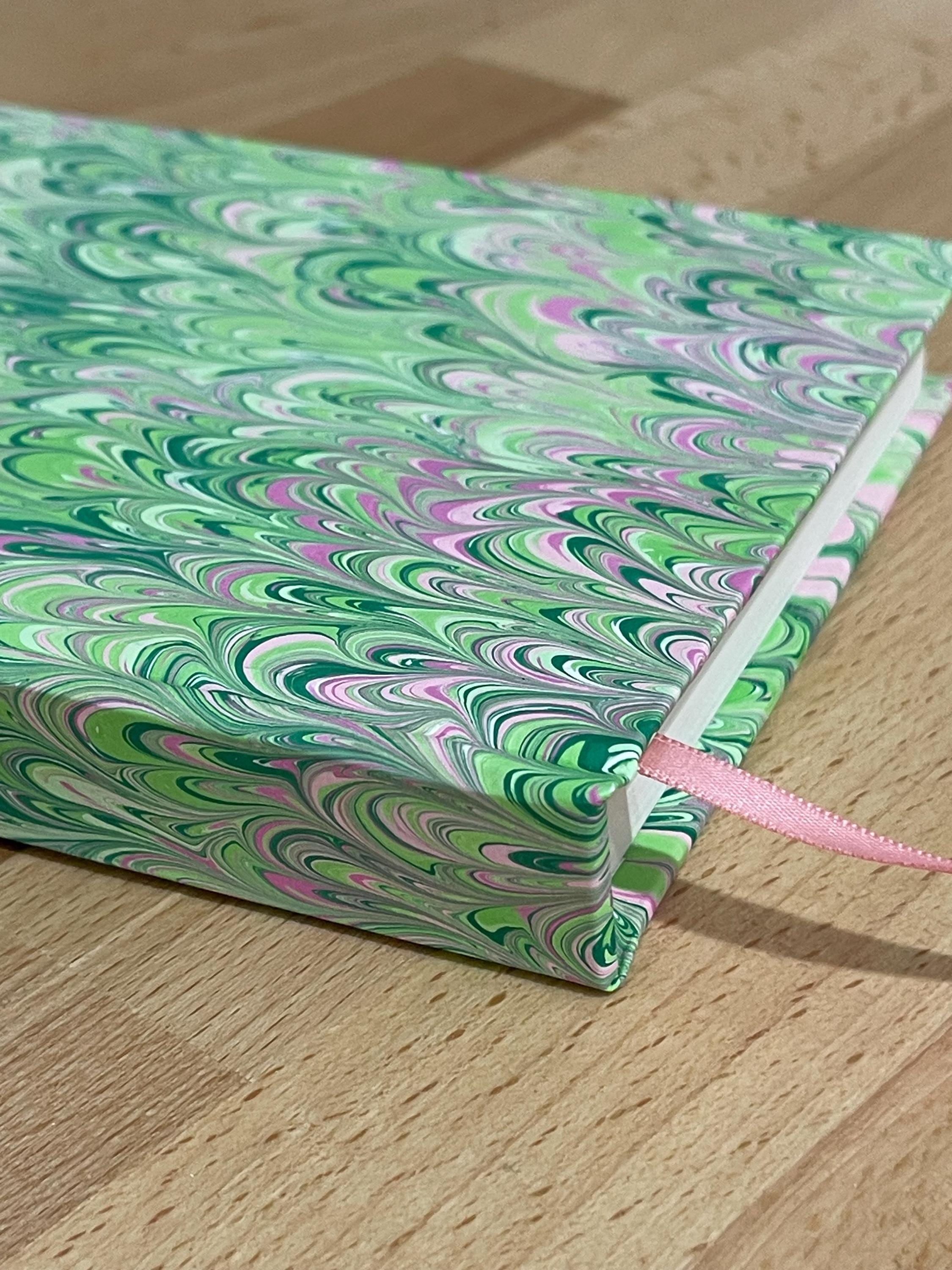 Hand marbled/painted notebook journal in green and pink bouquet pattern with a pink book mark and recycled white lined pages