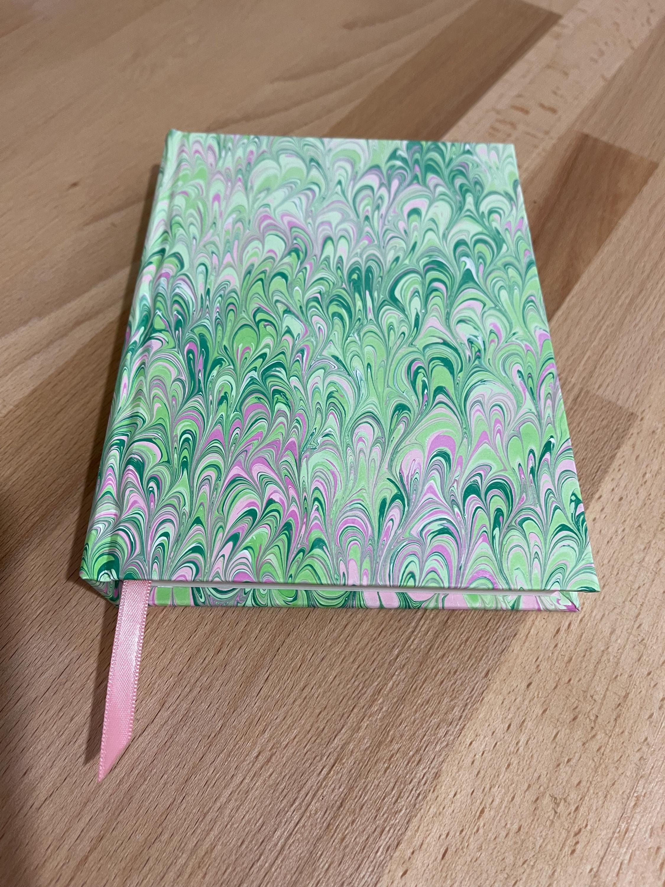 Hand marbled/painted notebook journal in green and pink bouquet pattern with a pink book mark and recycled white lined pages