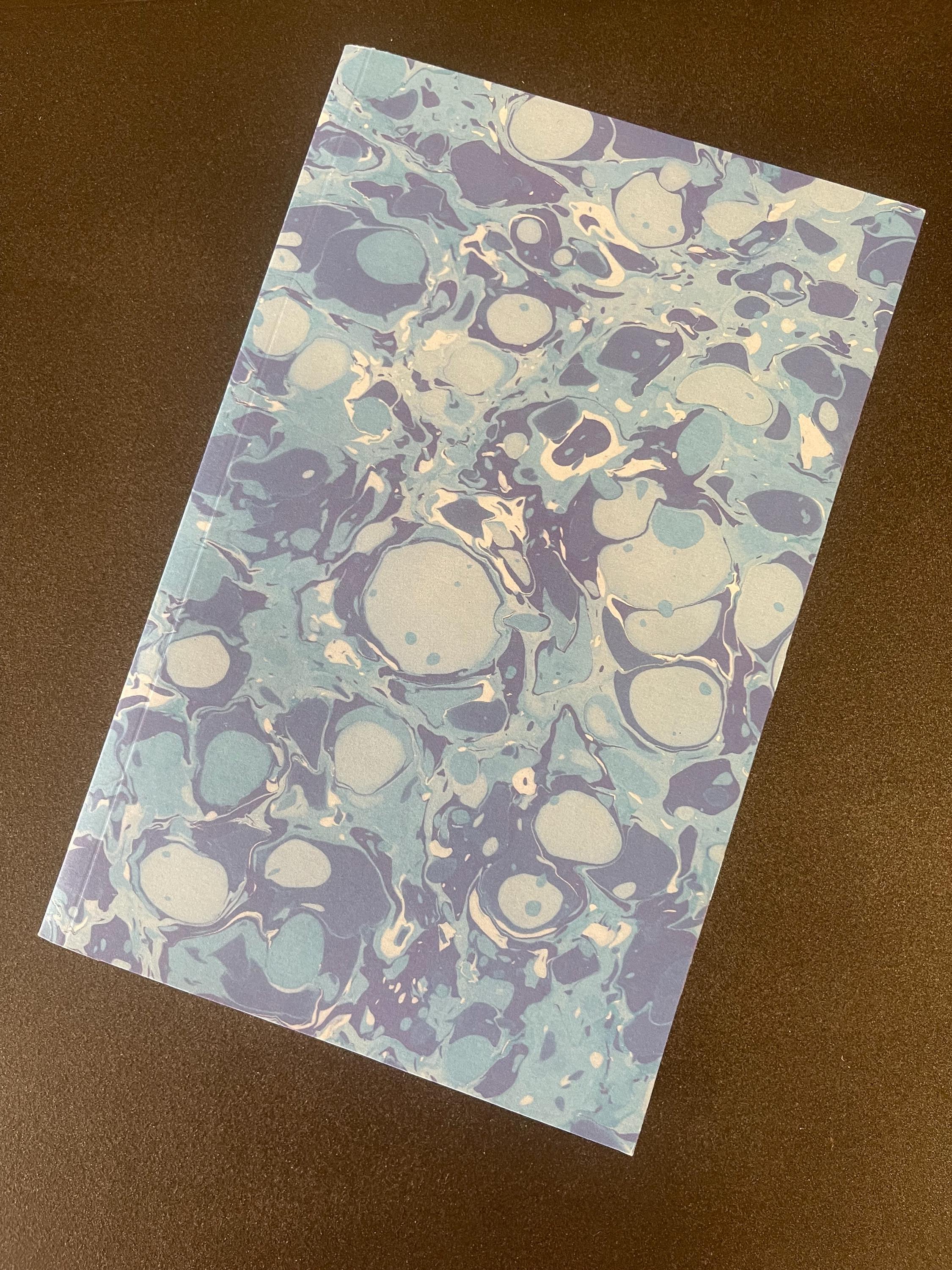 Marbled Notebook in gorgeous blues, a bold twist on tradition, soft recycled cover, 96 lined pages, practical notebook for daily use