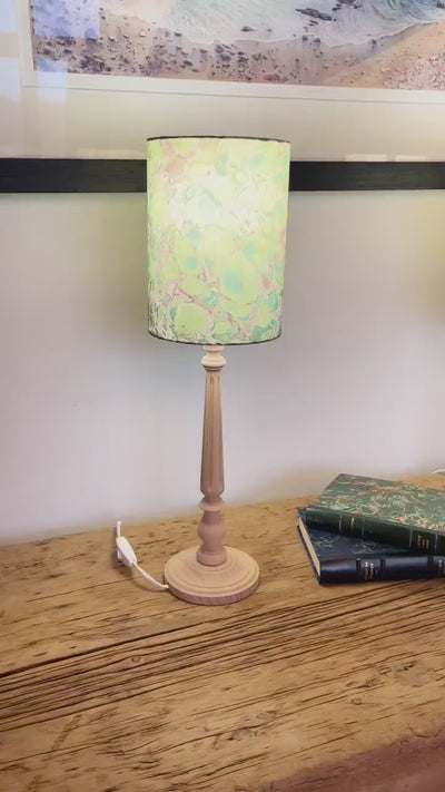 A pair of unique silk green and plum hand marbled drum table lampshades ideal as table or bedside lamps