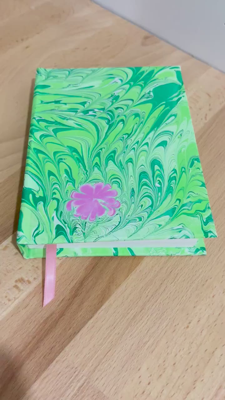 Hand marbled/painted flower notebook journal in green and pink with pink book mark and recycled white lined pages